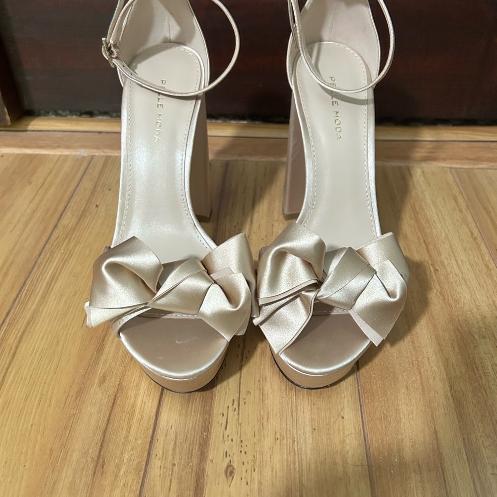 Pelle Moda Gold Satin Platform Heels with Bow